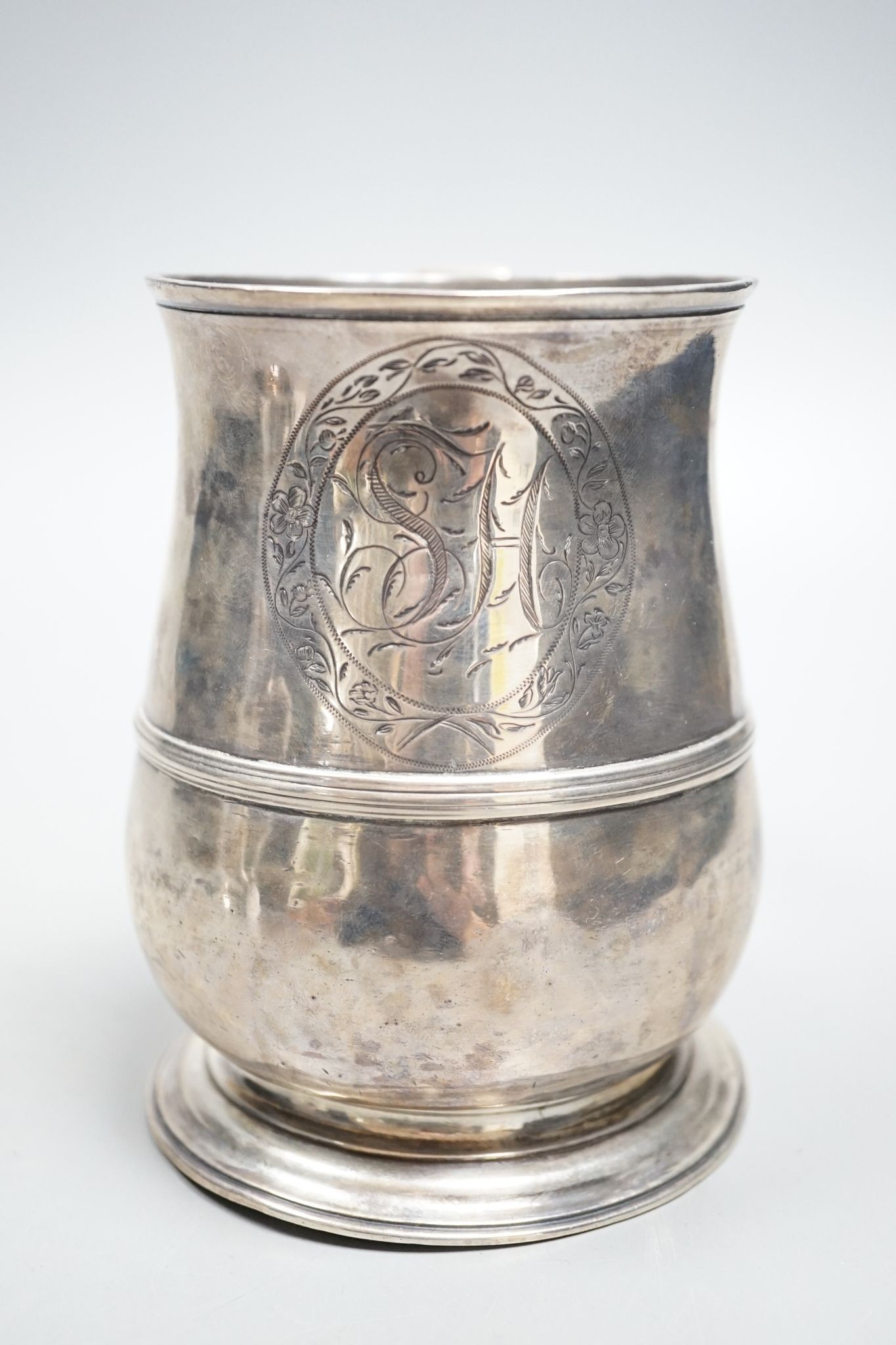 A George II silver baluster mug, with banded girdle, Benjamin Cartwright I, London, 1751, 12.2cm, 10.5oz.